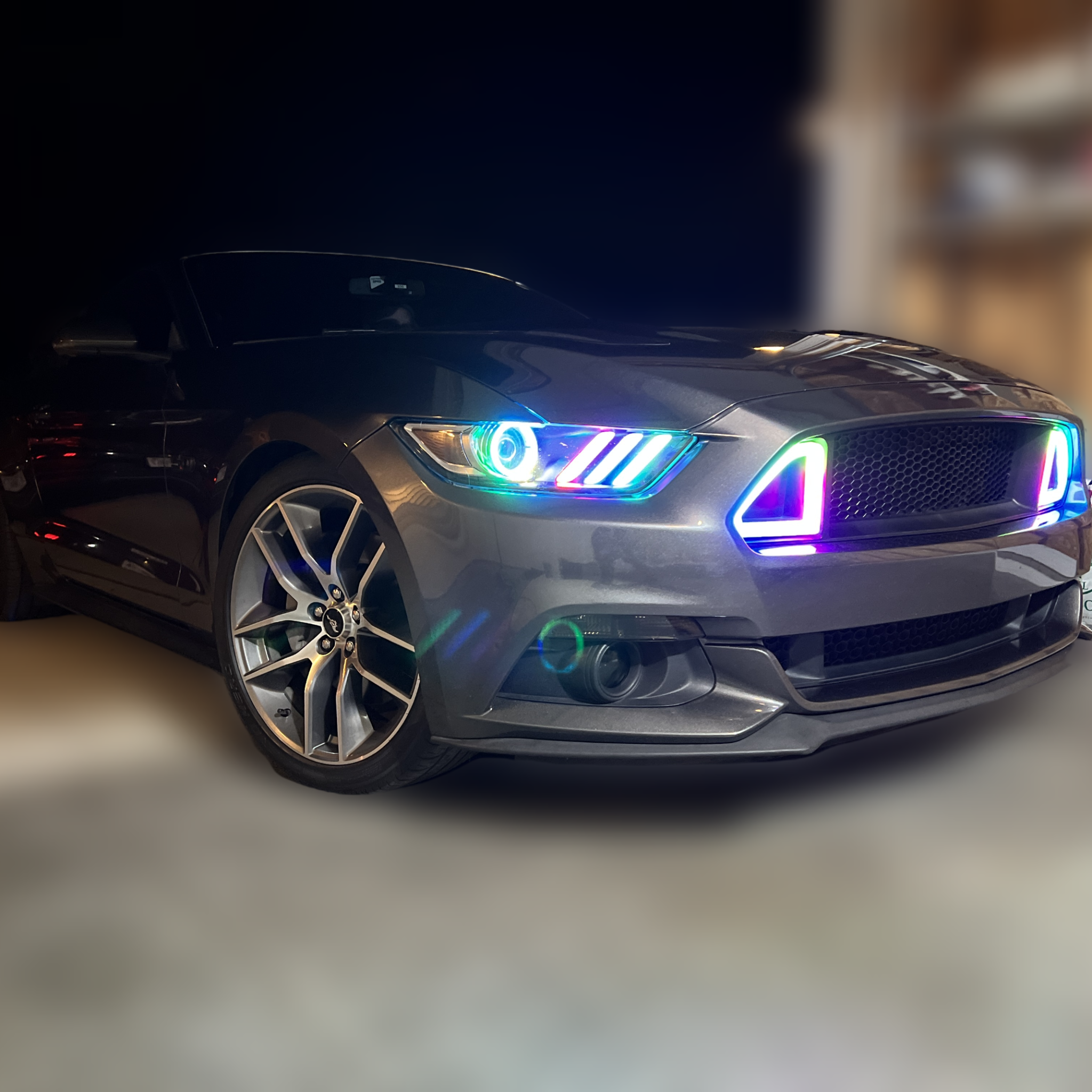 gray Mustang with custom lights
