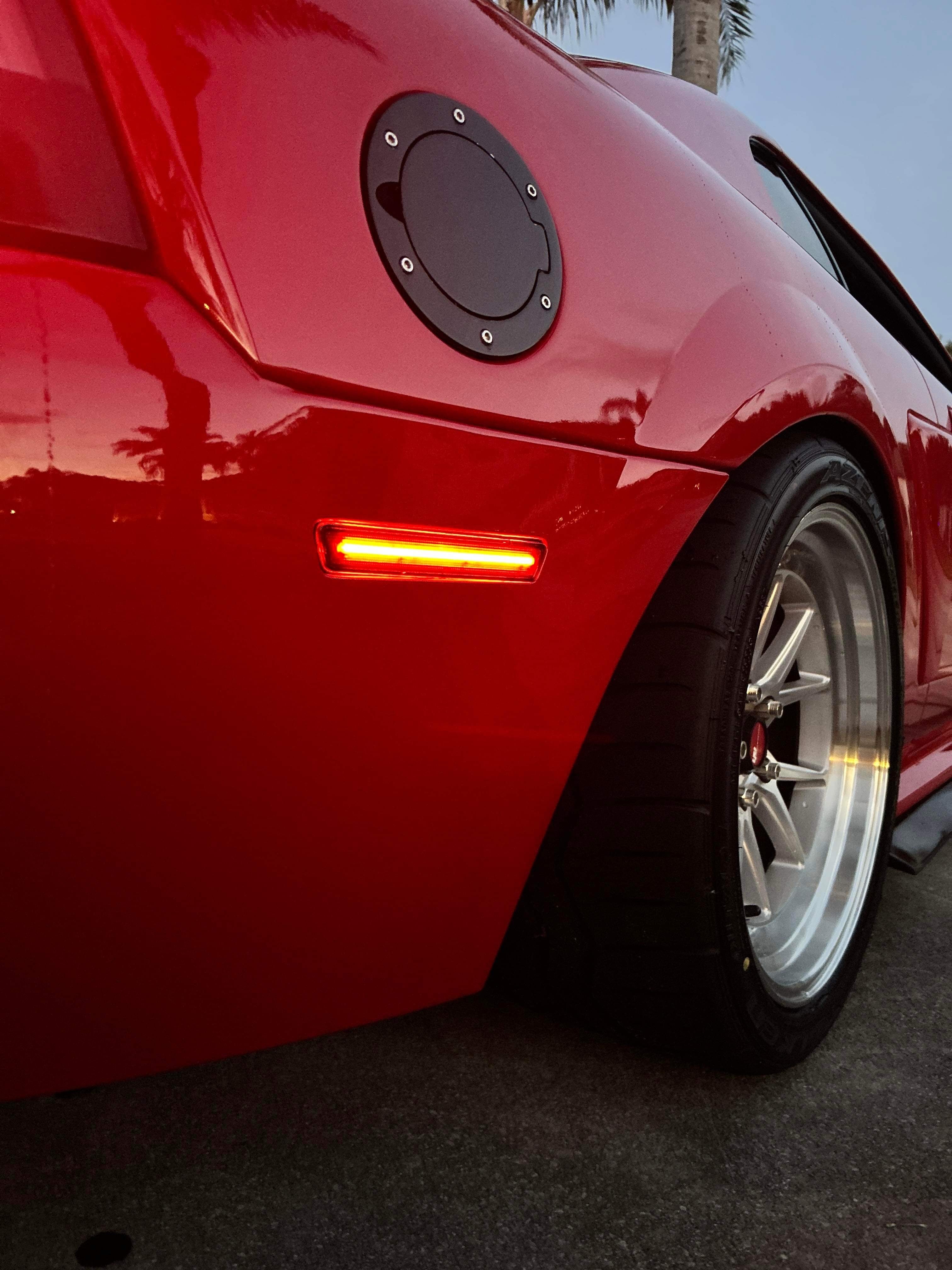 Red Mustang with side marker lights